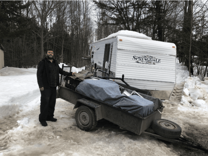 Sam qui est fier d’avoir rempli le «trailer»